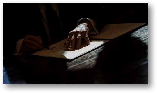 Trump signing an executive order